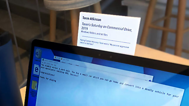 Photo Description: A laptop shows an open window and a text file.