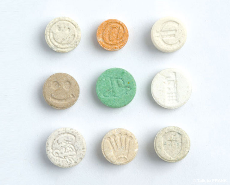 Picture of nine ecstasy tablets arranged in a square